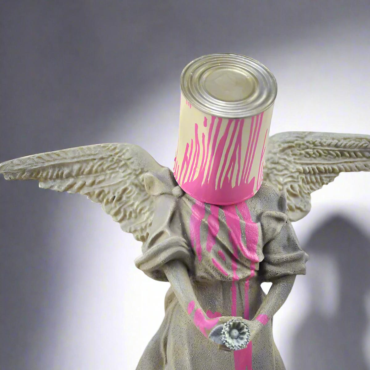 Modern Angel Sculpture with Pink Paint Bucket Street Art Style Decor