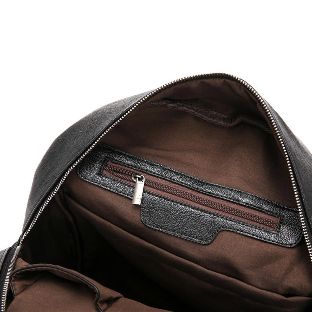 Interior view of punk rock backpack revealing laptop sleeve and zipper pocket