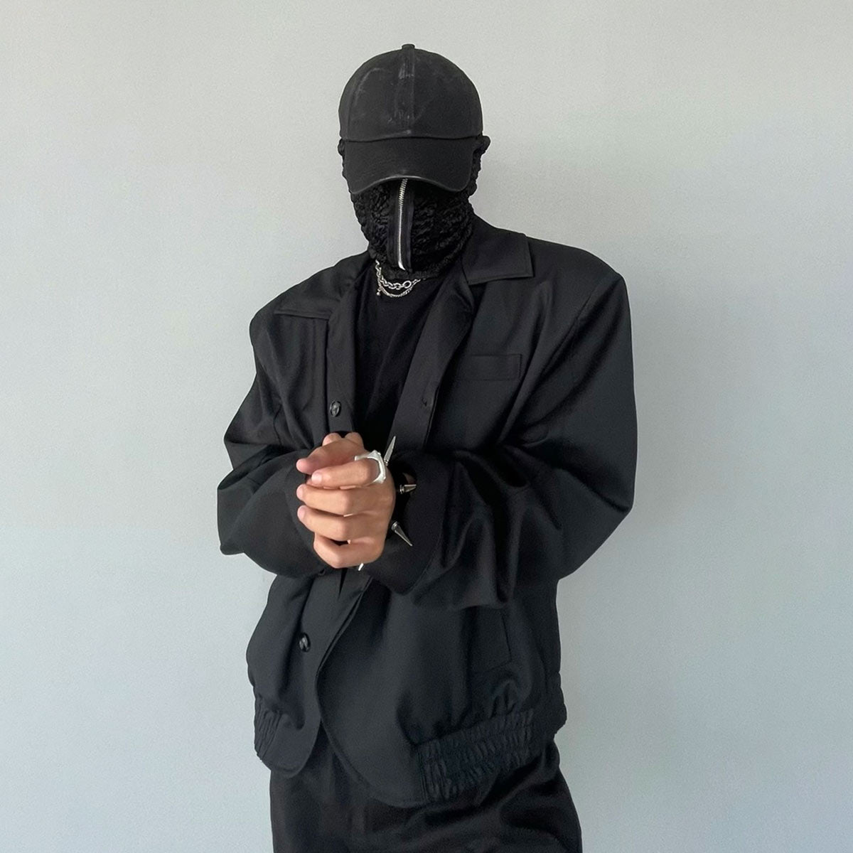 All-black outfit featuring Designer Balaclava with Zipper - Ultimate high fashion streetwear look